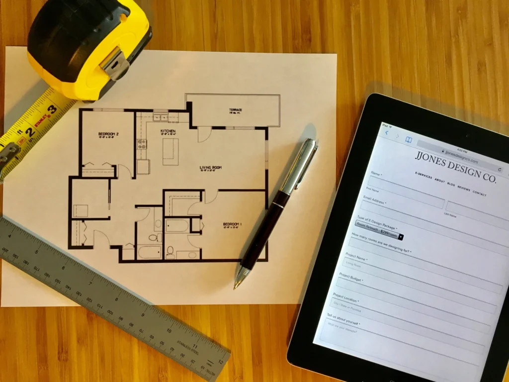 tape measure and tablet for bathroom refurbishment in Essex  